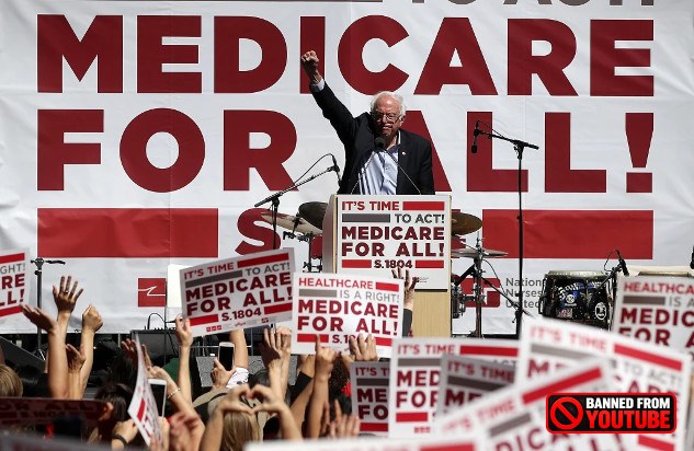 Trump’s Promises vs. Reality: Medicare and Social Security at Risk A rally with signs reading “Medicare for all,” showcasing grassroots advocacy.